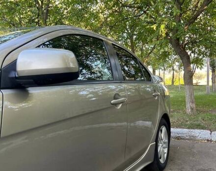 Бежевый Мицубиси Лансер, объемом двигателя 2 л и пробегом 146 тыс. км за 7750 $, фото 2 на Automoto.ua