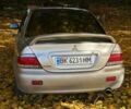 Бежевий Міцубісі Lancer, об'ємом двигуна 1.6 л та пробігом 200 тис. км за 3700 $, фото 16 на Automoto.ua