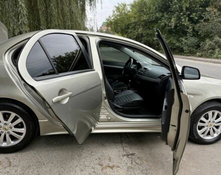 Бежевий Міцубісі Lancer, об'ємом двигуна 2 л та пробігом 280 тис. км за 6600 $, фото 4 на Automoto.ua