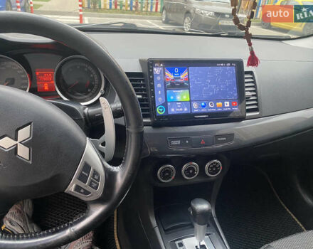 Бежевий Міцубісі Lancer, об'ємом двигуна 2 л та пробігом 173 тис. км за 7500 $, фото 9 на Automoto.ua