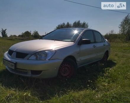 Бежевий Міцубісі Lancer, об'ємом двигуна 1.6 л та пробігом 200 тис. км за 3700 $, фото 3 на Automoto.ua