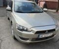 Бежевий Міцубісі Lancer, об'ємом двигуна 0.15 л та пробігом 185 тис. км за 6500 $, фото 1 на Automoto.ua