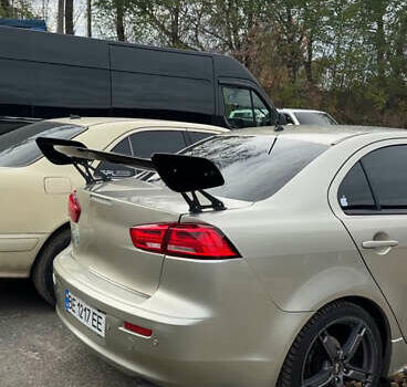 Бежевый Мицубиси Лансер, объемом двигателя 2 л и пробегом 225 тыс. км за 6999 $, фото 6 на Automoto.ua