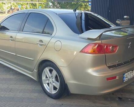 Бежевый Мицубиси Лансер, объемом двигателя 2 л и пробегом 280 тыс. км за 7600 $, фото 2 на Automoto.ua