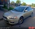 Бежевий Міцубісі Lancer, об'ємом двигуна 1.5 л та пробігом 200 тис. км за 3650 $, фото 2 на Automoto.ua