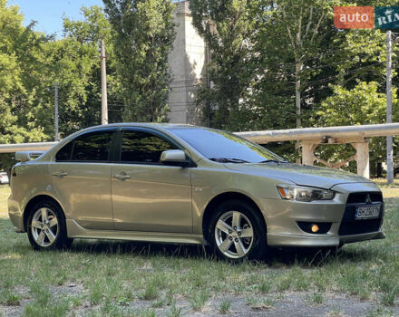 Бежевий Міцубісі Lancer, об'ємом двигуна 2 л та пробігом 189 тис. км за 6500 $, фото 1 на Automoto.ua