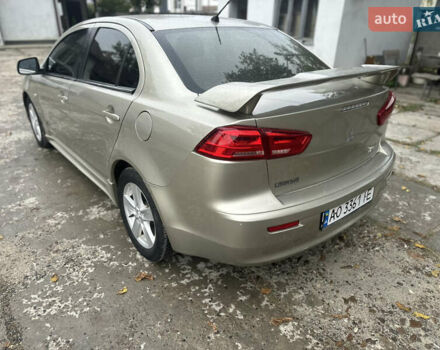 Бежевий Міцубісі Lancer, об'ємом двигуна 2 л та пробігом 312 тис. км за 4700 $, фото 6 на Automoto.ua