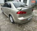 Бежевий Міцубісі Lancer, об'ємом двигуна 2 л та пробігом 312 тис. км за 4700 $, фото 6 на Automoto.ua