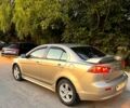 Бежевий Міцубісі Lancer, об'ємом двигуна 2 л та пробігом 68 тис. км за 8300 $, фото 1 на Automoto.ua
