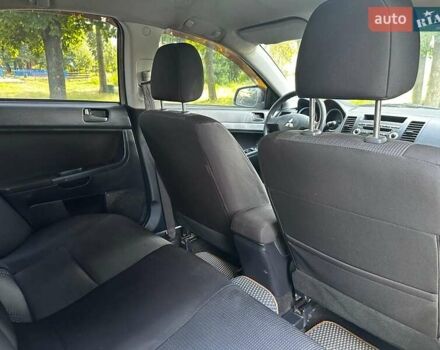 Бежевый Мицубиси Лансер, объемом двигателя 1.5 л и пробегом 192 тыс. км за 6690 $, фото 19 на Automoto.ua