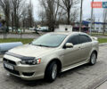 Бежевий Міцубісі Lancer, об'ємом двигуна 2 л та пробігом 262 тис. км за 6000 $, фото 7 на Automoto.ua