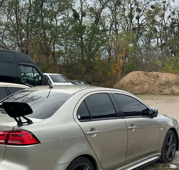 Бежевый Мицубиси Лансер, объемом двигателя 2 л и пробегом 225 тыс. км за 6999 $, фото 7 на Automoto.ua