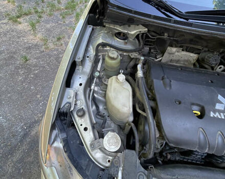 Бежевий Міцубісі Lancer, об'ємом двигуна 2 л та пробігом 189 тис. км за 6500 $, фото 15 на Automoto.ua