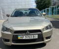 Бежевий Міцубісі Lancer, об'ємом двигуна 2 л та пробігом 163 тис. км за 7700 $, фото 1 на Automoto.ua
