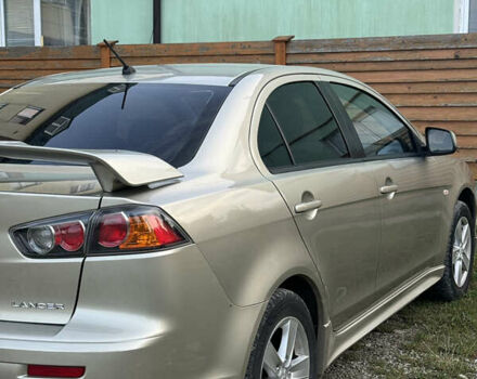 Бежевый Мицубиси Лансер, объемом двигателя 2 л и пробегом 240 тыс. км за 6500 $, фото 4 на Automoto.ua