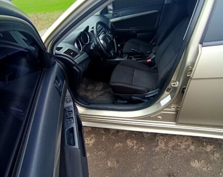 Бежевый Мицубиси Лансер, объемом двигателя 2 л и пробегом 160 тыс. км за 6500 $, фото 8 на Automoto.ua