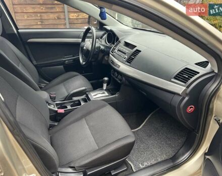 Бежевый Мицубиси Лансер, объемом двигателя 1.5 л и пробегом 230 тыс. км за 5950 $, фото 11 на Automoto.ua