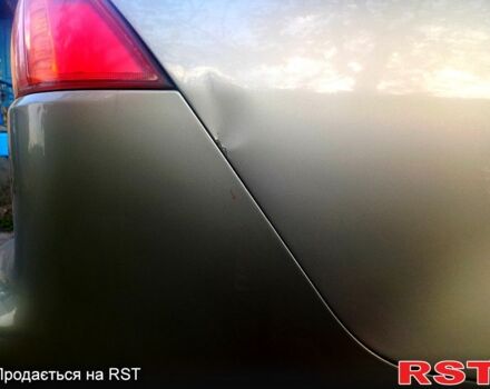 Бежевий Міцубісі Lancer, об'ємом двигуна 2 л та пробігом 209 тис. км за 7400 $, фото 4 на Automoto.ua