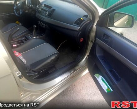 Бежевий Міцубісі Lancer, об'ємом двигуна 2 л та пробігом 209 тис. км за 7400 $, фото 8 на Automoto.ua