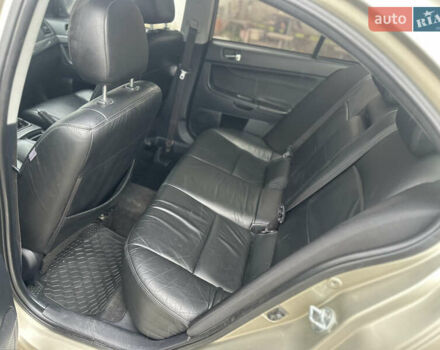 Бежевий Міцубісі Lancer, об'ємом двигуна 2 л та пробігом 312 тис. км за 4700 $, фото 9 на Automoto.ua