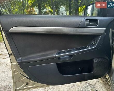 Бежевый Мицубиси Лансер, объемом двигателя 1.5 л и пробегом 192 тыс. км за 6690 $, фото 6 на Automoto.ua