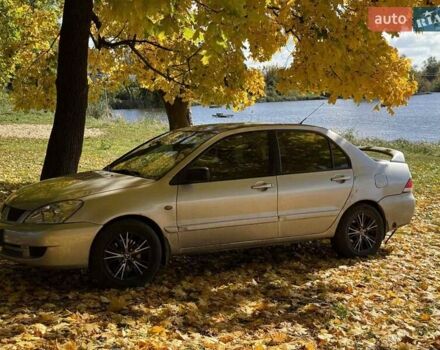 Бежевий Міцубісі Lancer, об'ємом двигуна 1.6 л та пробігом 200 тис. км за 3700 $, фото 13 на Automoto.ua