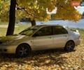 Бежевий Міцубісі Lancer, об'ємом двигуна 1.6 л та пробігом 200 тис. км за 3700 $, фото 13 на Automoto.ua