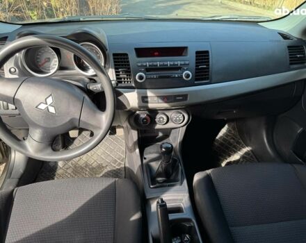 Бежевий Міцубісі Lancer, об'ємом двигуна 1.5 л та пробігом 217 тис. км за 5690 $, фото 14 на Automoto.ua
