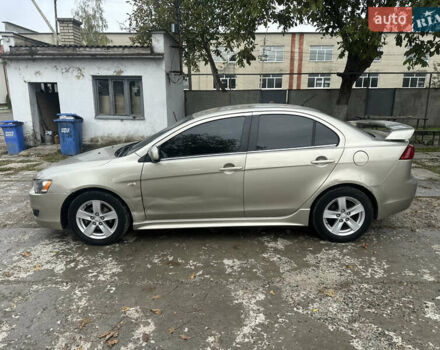 Бежевий Міцубісі Lancer, об'ємом двигуна 2 л та пробігом 312 тис. км за 4700 $, фото 4 на Automoto.ua