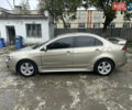 Бежевий Міцубісі Lancer, об'ємом двигуна 2 л та пробігом 312 тис. км за 4700 $, фото 4 на Automoto.ua