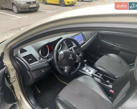 Бежевий Міцубісі Lancer, об'ємом двигуна 2 л та пробігом 173 тис. км за 7500 $, фото 1 на Automoto.ua