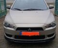 Бежевий Міцубісі Lancer, об'ємом двигуна 0.15 л та пробігом 267 тис. км за 6300 $, фото 1 на Automoto.ua