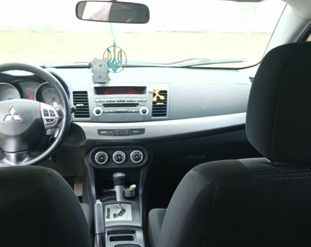 Бежевый Мицубиси Лансер, объемом двигателя 2 л и пробегом 191 тыс. км за 5300 $, фото 6 на Automoto.ua