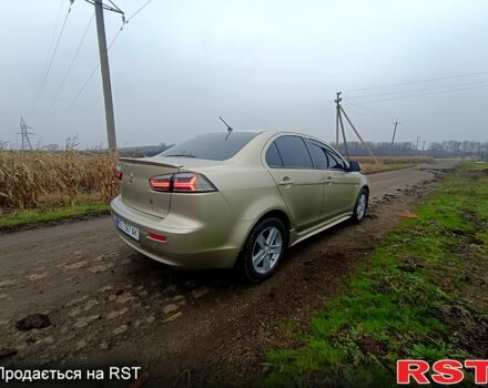 Бежевый Мицубиси Лансер, объемом двигателя 2 л и пробегом 160 тыс. км за 6500 $, фото 2 на Automoto.ua