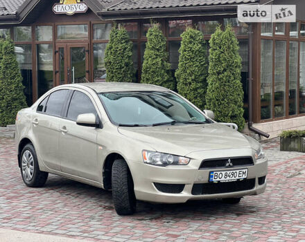 Бежевий Міцубісі Lancer, об'ємом двигуна 1.5 л та пробігом 160 тис. км за 4999 $, фото 11 на Automoto.ua