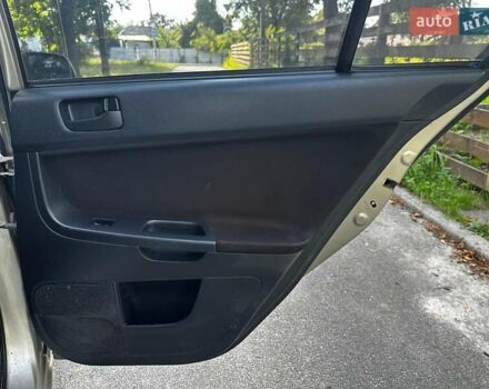 Бежевый Мицубиси Лансер, объемом двигателя 1.5 л и пробегом 192 тыс. км за 6690 $, фото 18 на Automoto.ua