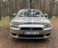 Бежевий Міцубісі Lancer, об'ємом двигуна 2 л та пробігом 262 тис. км за 6500 $, фото 1 на Automoto.ua