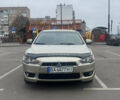 Бежевий Міцубісі Lancer, об'ємом двигуна 1.5 л та пробігом 240 тис. км за 5200 $, фото 1 на Automoto.ua