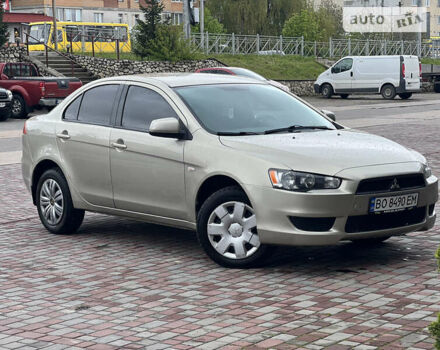 Бежевий Міцубісі Lancer, об'ємом двигуна 1.5 л та пробігом 160 тис. км за 4999 $, фото 1 на Automoto.ua