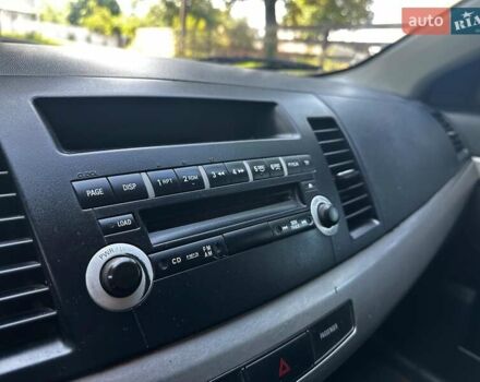 Бежевый Мицубиси Лансер, объемом двигателя 1.5 л и пробегом 192 тыс. км за 6690 $, фото 10 на Automoto.ua