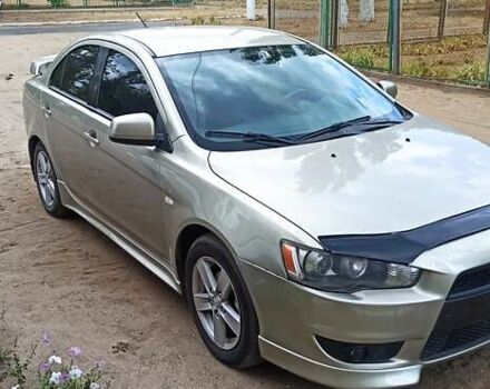Бежевый Мицубиси Лансер, объемом двигателя 2 л и пробегом 235 тыс. км за 7200 $, фото 2 на Automoto.ua