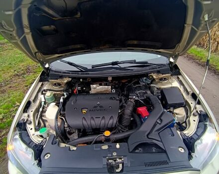 Бежевый Мицубиси Лансер, объемом двигателя 2 л и пробегом 160 тыс. км за 6500 $, фото 7 на Automoto.ua