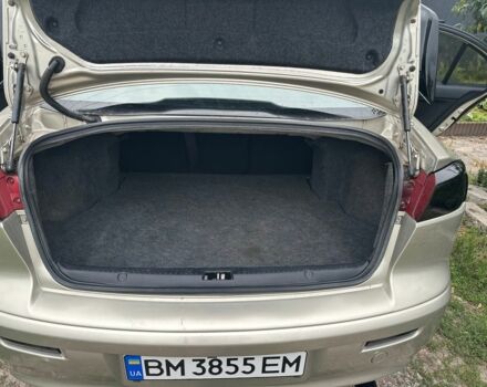 Бежевый Мицубиси Лансер, объемом двигателя 1.5 л и пробегом 250 тыс. км за 6000 $, фото 11 на Automoto.ua