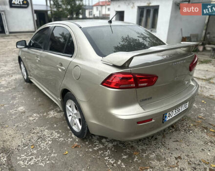 Бежевий Міцубісі Lancer, об'ємом двигуна 2 л та пробігом 312 тис. км за 4700 $, фото 5 на Automoto.ua