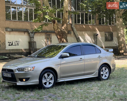 Бежевий Міцубісі Lancer, об'ємом двигуна 2 л та пробігом 189 тис. км за 6500 $, фото 6 на Automoto.ua