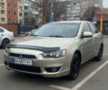 Бежевий Міцубісі Lancer, об'ємом двигуна 1.5 л та пробігом 240 тис. км за 4400 $, фото 1 на Automoto.ua