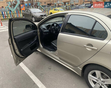 Бежевий Міцубісі Lancer, об'ємом двигуна 2 л та пробігом 173 тис. км за 7500 $, фото 2 на Automoto.ua
