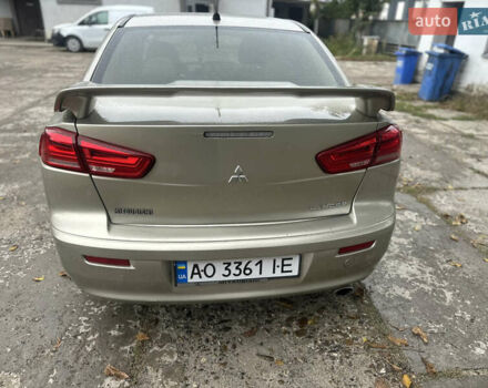 Бежевий Міцубісі Lancer, об'ємом двигуна 2 л та пробігом 312 тис. км за 4700 $, фото 7 на Automoto.ua