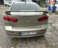 Бежевий Міцубісі Lancer, об'ємом двигуна 2 л та пробігом 312 тис. км за 4700 $, фото 7 на Automoto.ua