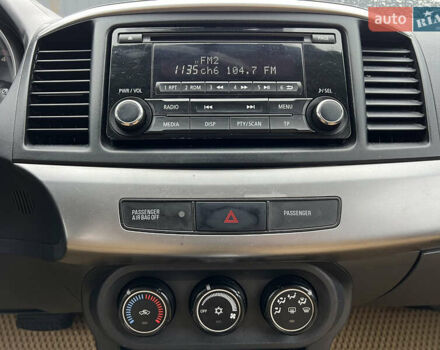 Бежевий Міцубісі Lancer, об'ємом двигуна 1.5 л та пробігом 245 тис. км за 6499 $, фото 11 на Automoto.ua